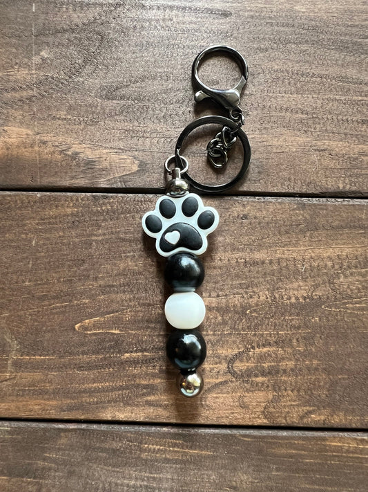 Beaded keychain with silicone paw print